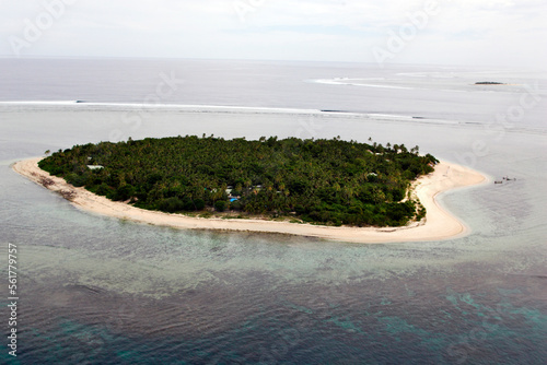 Waves reel across from the island of Tavarua, Fiji in this aerial view photo