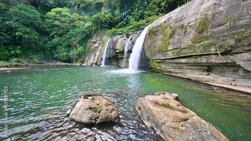 Small but beautiful waterfalls, clear streams, big rocks and green trees. Lingjiao Waterfall, Pingxi District, New Taipei City, Taiwan photo