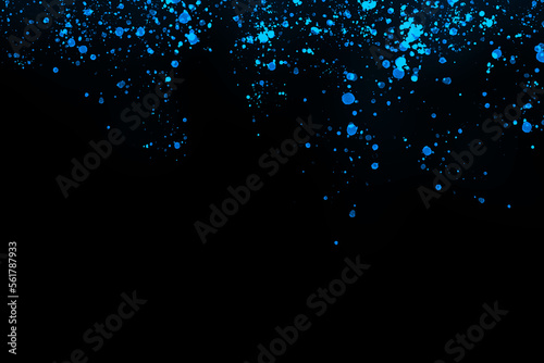Black background with drops, dots, blots, megumi and dust. Of blue color. photo