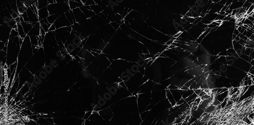 Texture of broken glass, cracked screen background © kusum