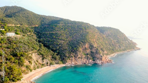 aerial view of the typical landscape of Costa Brava with cliffs at the sea that gives its name, "rugged coast", coastline between Sant Feliu de Guíxols and Tossa de Mar, Canyet de Mar, Girona, Spain