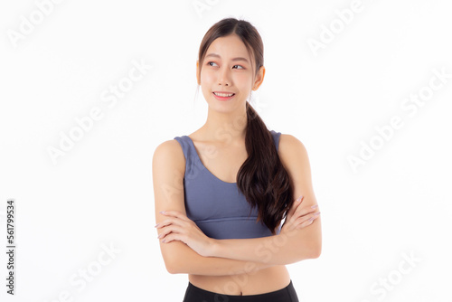 Portrait of beautiful young asian woman in sportwear smile and crossed arms isolated on white background, sport and exercise for health and weightloss, female and slimming with confident and wellness. © N_studio