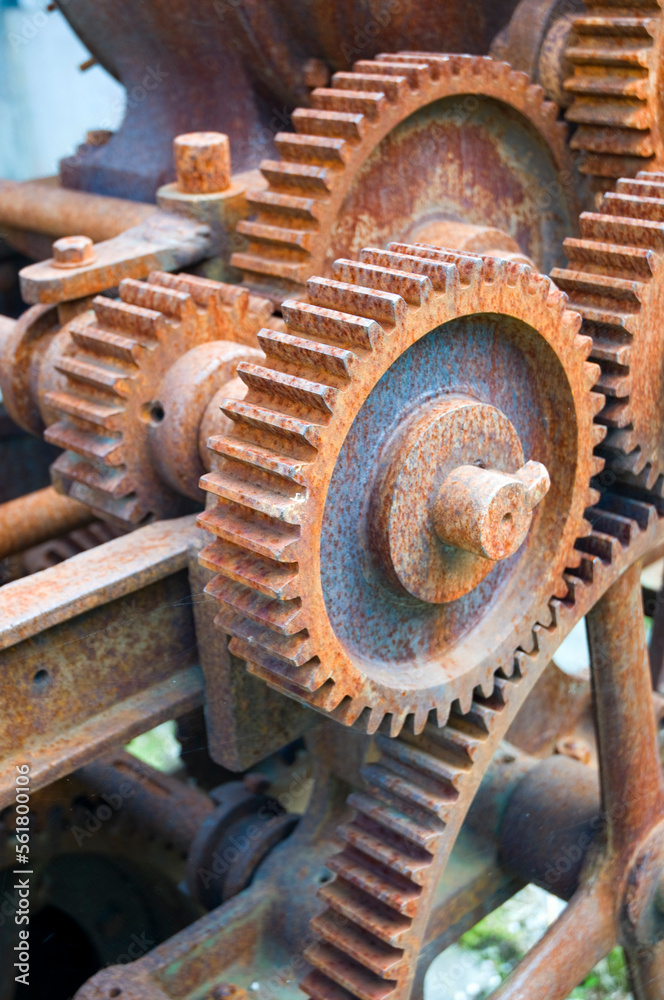 Rusty machinery with cogs and gears, used for rope making Rusty machinery with cogs and gears, used for rope making