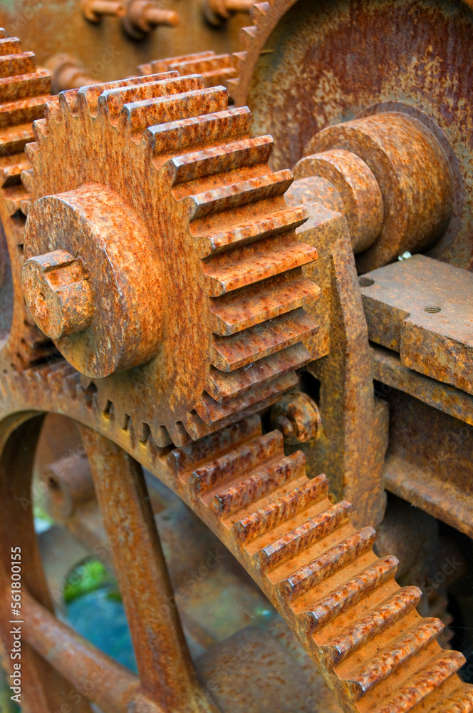 Rusty machinery with cogs and gears, used for rope making Rusty machinery with cogs and gears, used for rope making