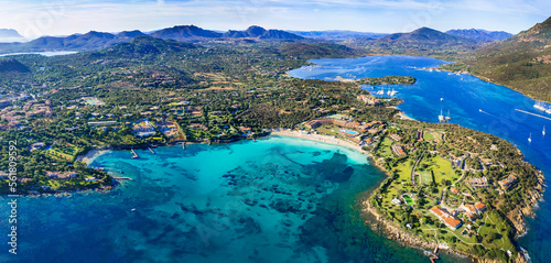 Fototapeta Naklejka Na Ścianę i Meble -  Italy summer holidyas . Sardegna island - stunning Emerald coast (costa smeralda) with  beautiful beaches. aerial view of Ira beach with turquoise sea