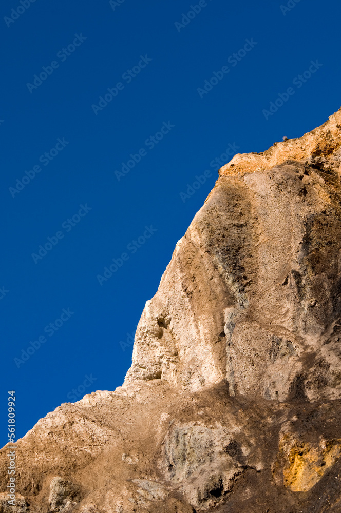 Looking up at the cliffs on a sunny day