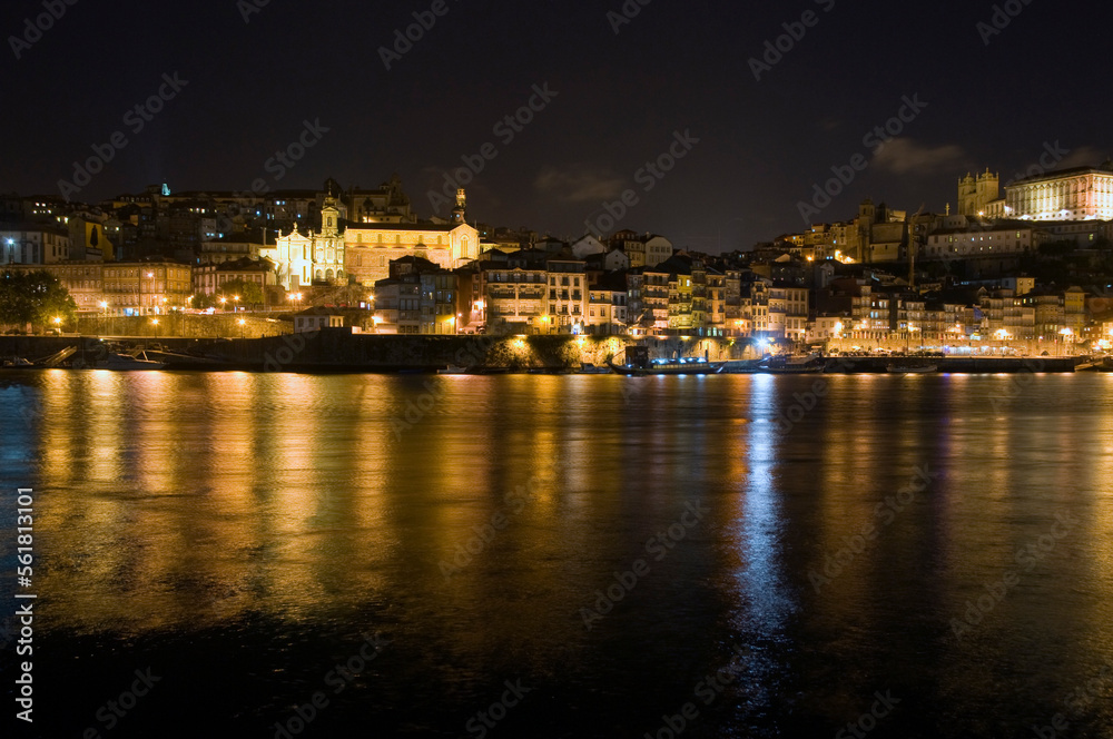 Night scene, Porto Portugal, with reflections in the river Douro.