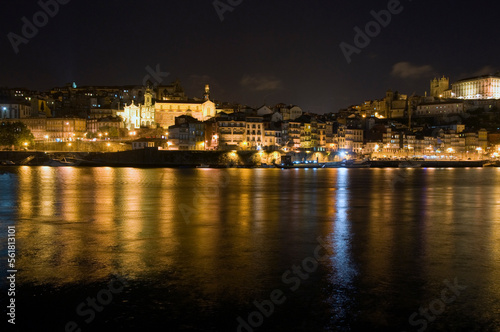 Night scene, Porto Portugal, with reflections in the river Douro. © Wildwatertv