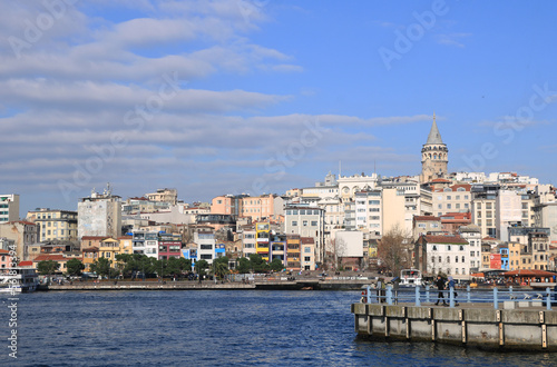 The Galata Tower and The Golden Horn in a cloudy day in Istanbul, Turkey. © snowflakedesert