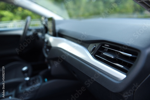 Close-up of the dashboard, adjustment of the blower, air conditioner. Elements of air conditioning and heating in the car. 