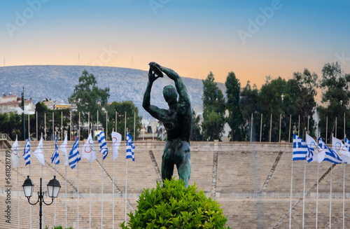view from classical Athens with Panathenaic stadium (1st olympic games at 1896) and statue of discobolus stading opposite it. Greece photo