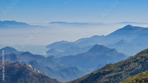 Fotografi Panoramic view of dramatic karst mountain chains Dinaric Alps surrounding the Lake Skadar National Park seen from Goli Vrh, Montenegro, Balkan, Europe