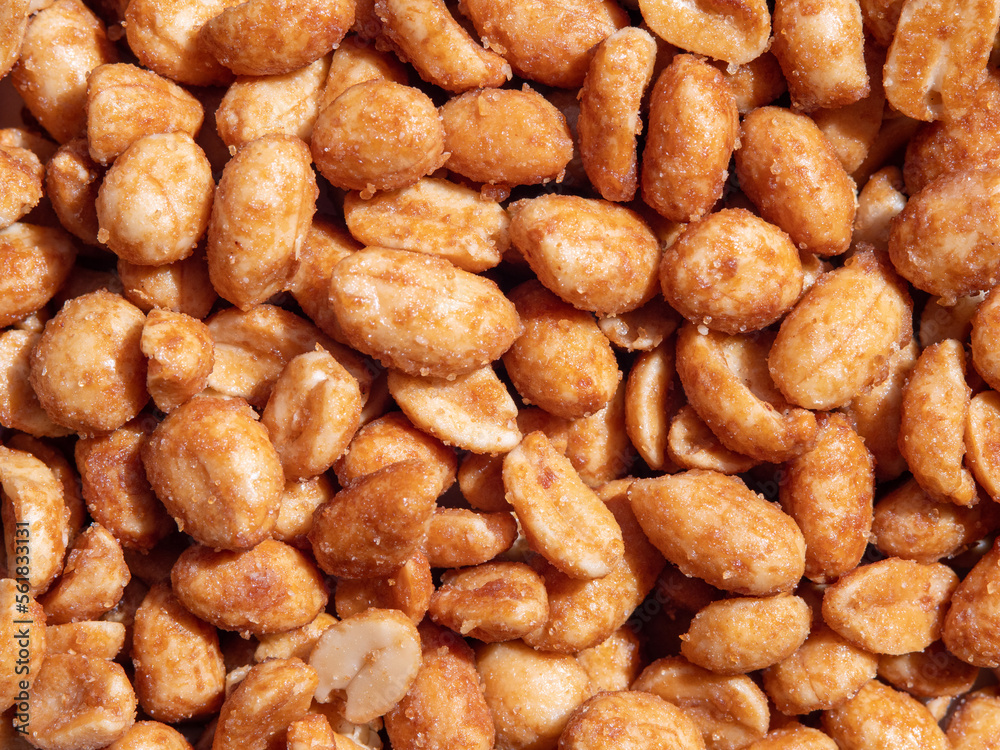 Beautiful tasty roasted honey peanuts texture for backgrounds and other purposes Beautiful tasty roasted honey peanuts texture for backgrounds and other purposes