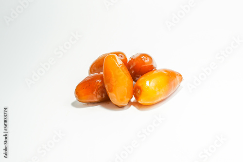 Fresh ripe yellow dates, fresh dates ruthob isolated on white background photo