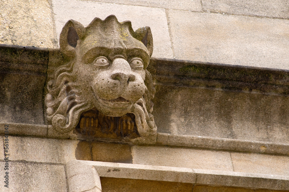 A carved lion-like gargoyle on an Oxford College UK