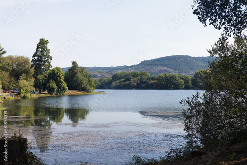 lake with mountains in the background