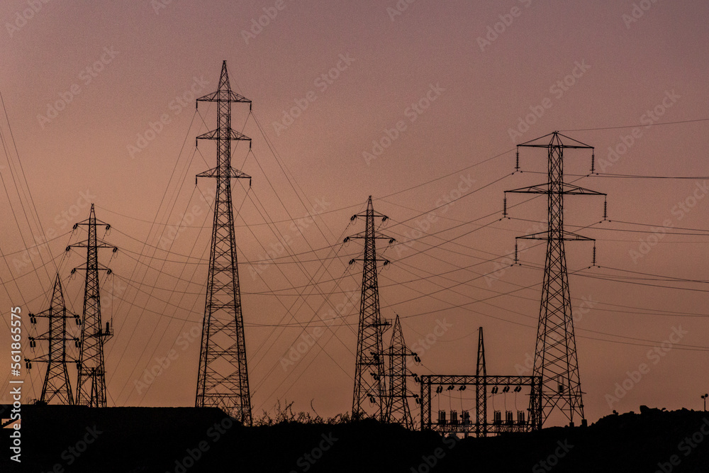 Silhouettes of the power transmissions near Aswan Dam, Egypt