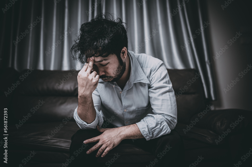 Asian handsome man stress from work overload,Tired male come back home after a lot of work from company,risk of depression Asian handsome man stress from work overload,Tired male come back home after a lot of work from company,risk of depression