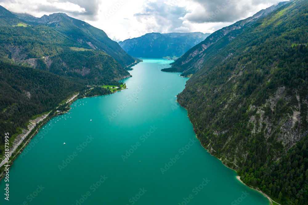 Austrian glacier water sea mountains lake landscape nature drone shot clouds sky green village alaska norway fjord blue forest 