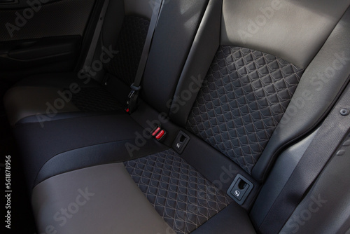 Modern car fabric seats close up © Brylynskyi