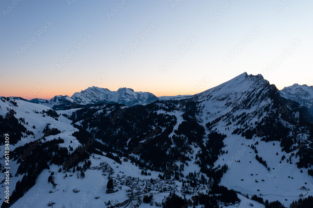 Wonderful scenery after a snow storm during a calm morning. The Swiss snowy landscape.