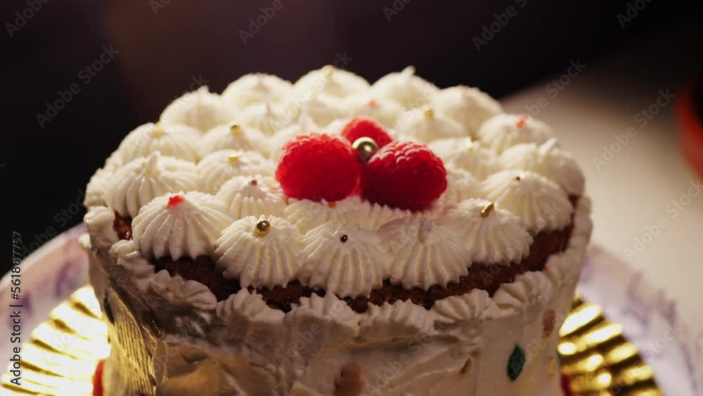 A slice of cake with cream cheese and strawberry closeup, homemade cake, dessert in cafe. A slice of cake with cream cheese and strawberry closeup, homemade cake, dessert in cafe.
