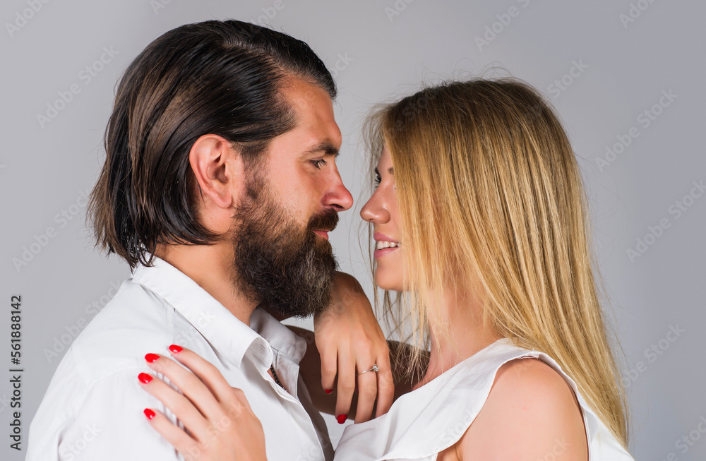 Couple in tender passion. Sensual relationships. Portrait of young couple. Woman and man closeup.