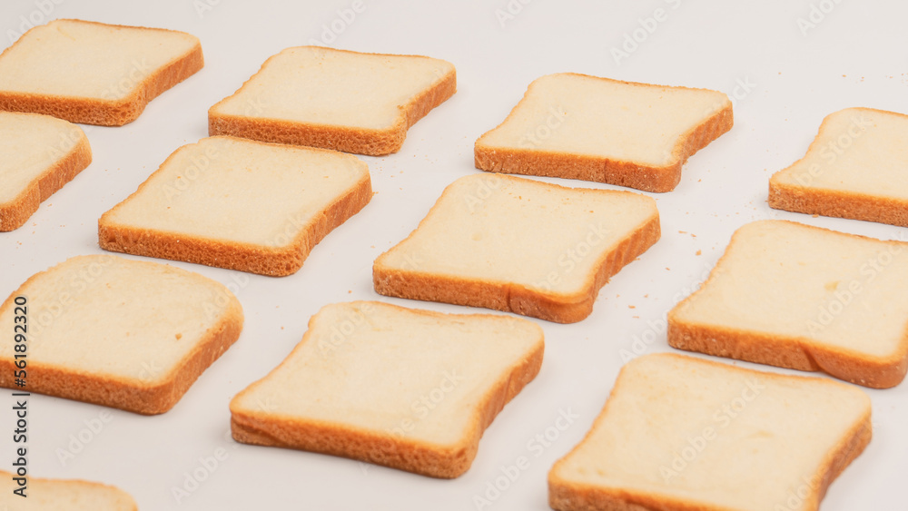 Delicious bread slices isolated on a white background, top view. Delicious bread slices isolated on a white background, top view.
