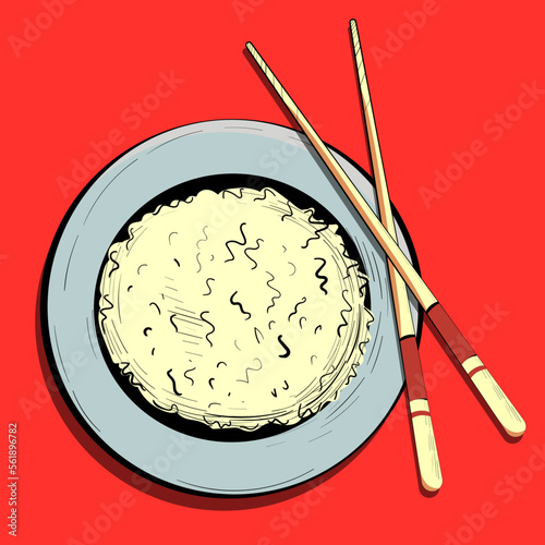 Rice on a plate with chopsticks