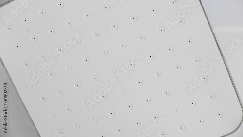 Full frame close up image of large square shower head