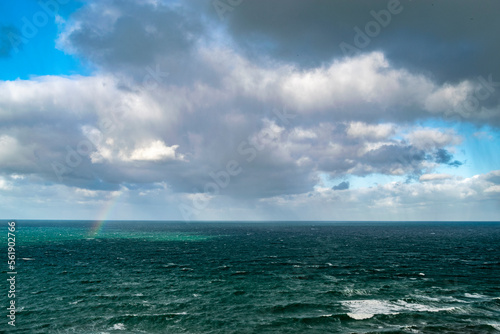 A storm over the sea with a rainbow