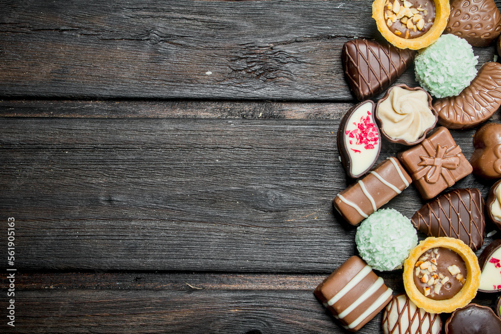 Chocolate sweets with nuts and various fillings. Chocolate sweets with nuts and various fillings.