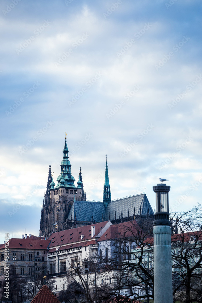 Obraz premium Taking a photograph in Karlov Bridge, Prague Bridges in the Summer on the Sunset. Czech Republic. Prague, Czech Republic. Panoramic cityscape image of famous Charles Bridge in Prague during beautiful 