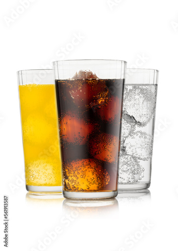 Fotografie Cola soda drink with lemonade and orange soda with ice cubes and bubbles on white