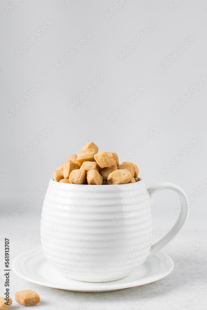 Nigerian Chin chin in a ceramic cup, Fried chinchin snack in a cup