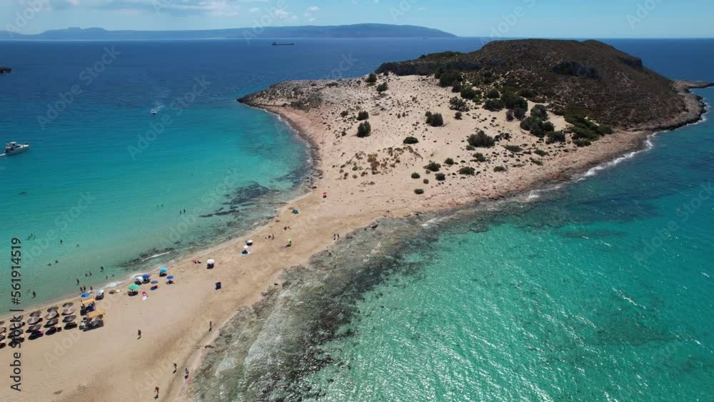 Aerial video of Simos beach in Elafonisos. Located in south Peloponnese elafonisos is a small island very famous for the paradise sandy beaches and the turquoise waters. Aerial video of Simos beach in Elafonisos. Located in south Peloponnese elafonisos is a small island very famous for the paradise sandy beaches and the turquoise waters.