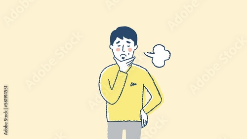 悩みながらため息をつく中年男性　上半身