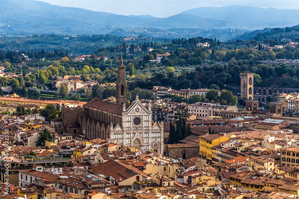 Florence, Italy. Picturesque view of the city from the height of the Duomo dome. In the center of the Basilica of Santa Croce