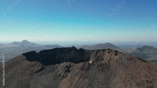 Aerial views over the black volcano (Jabal Qidr) in Harrat Khaybar, north west Saudi Arabia photo