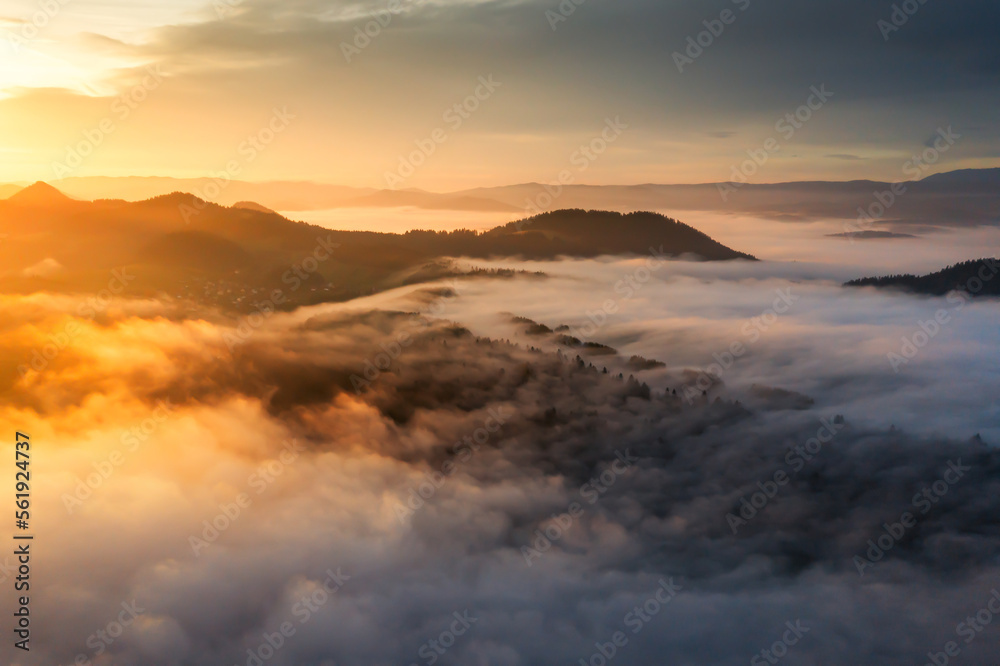 Scenic foggy sunrise in autumn