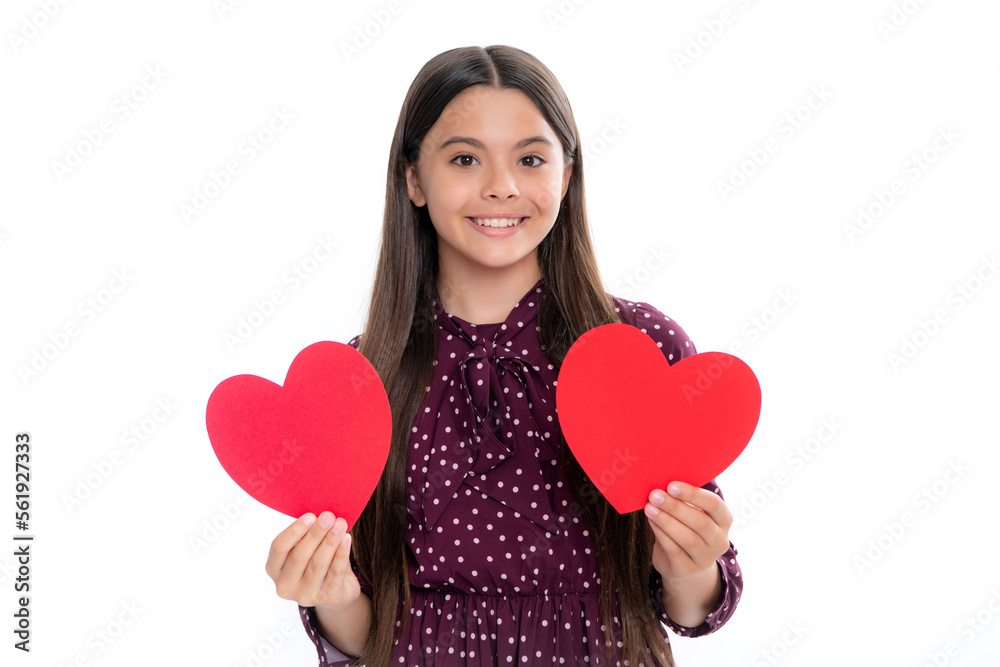Happiness kids and love concept. Romantic lovely teen girl with red heart, world heart day, happy valentines day. Portrait of happy smiling teenage child girl.