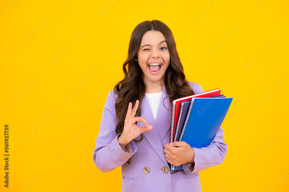 Amazed teen girl. Teenager school girl study with books. Learning knowledge and kids education concept. Excited expression, cheerful and glad. Amazed teen girl. Teenager school girl study with books. Learning knowledge and kids education concept. Excited expression, cheerful and glad.