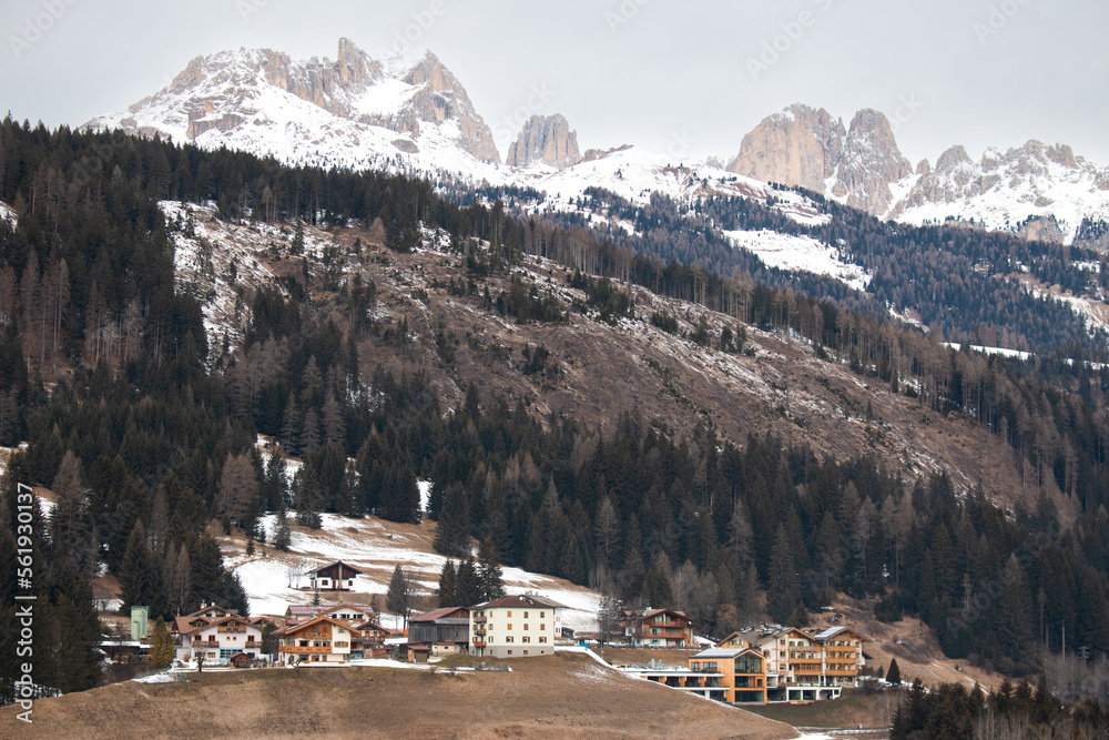 Dolomites in warm winter without much snow in January 2023, Moena, Italy