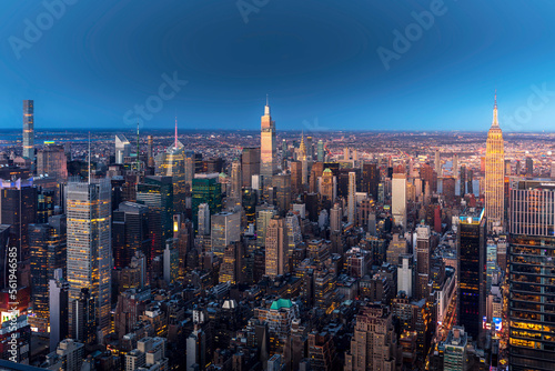 New York, USA - April 30, 2022: New York skyline at the end of sunset with Chrysler Building in foreground