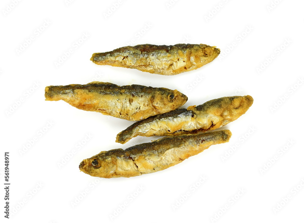 Deep Fried small Fishes Isolated On White Background. Simply food ,simply cooking - fried anchovies. Deep Fried small Fishes Isolated On White Background. Simply food ,simply cooking - fried anchovies.