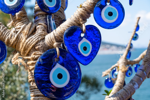 Evil eye beads closeup. Nazar beads. Turkish superstition and tourist souvenir, Grand Bazaar, Istanbul, Turkey photo