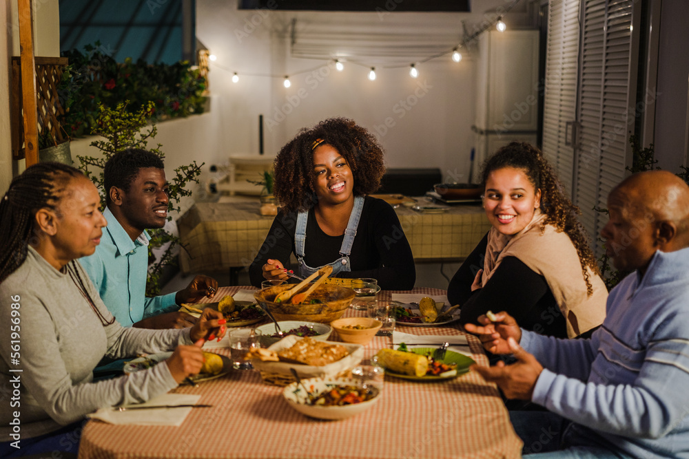 Family evening meal with healthy food and enjoying on the terrace - concept family life, healthy food Family evening meal with healthy food and enjoying on the terrace - concept family life, healthy food