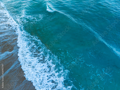 Sea surface aerial view,Bird eye view photo of waves and water surface texture,Turquoise sea background, Beautiful nature Amazing view sea background © panya99