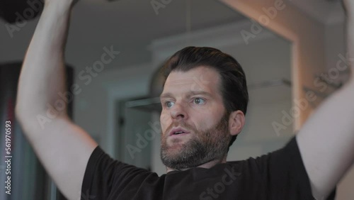 Man lifting dumbbells at the gym, working out, incline press, arm curls, motivation, in shape, gym workout. 4K 24FPS