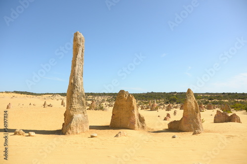 Three pillars standing on the desert